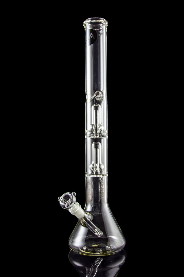 Clear glass bong with intricate bubbler and reflective surface against a black background.