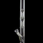 A front view of the LA Pipes Thick Glass Straight Tube Bong with Showerhead Perc, showcasing its clear glass construction and tall, cylindrical shape.