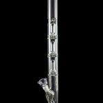 A tall, clear glass bong with multiple chambers and a glass bowl, isolated on a black background.