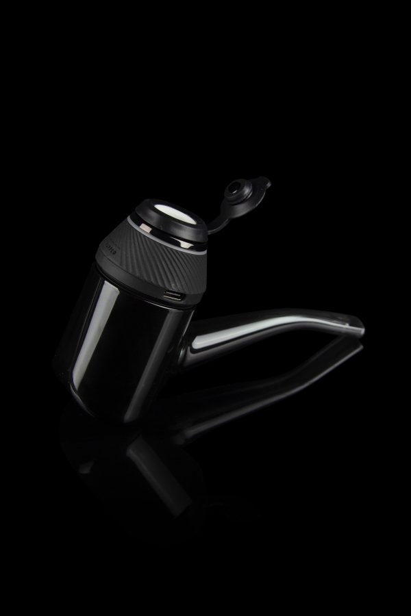 Sleek, black cannabis oil vape pen with a glass mouthpiece, isolated on a dark background.