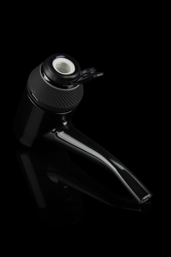 Sleek black glass cannabis oil burner pipe on a dark background.