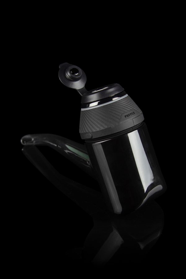 Black Puffco Peak Pro portable vaporizer with glass attachment.
