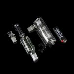 Two glass bubblers with intricate percolators, isolated on a black background.