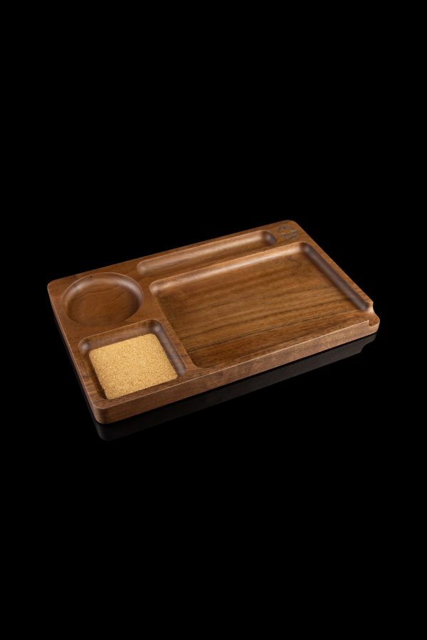 Wooden rolling tray with divided compartments and a built-in grinder, isolated on a black background.