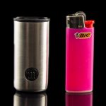 Stainless steel one-hitter pipe and pink Bic lighter on a reflective black surface.