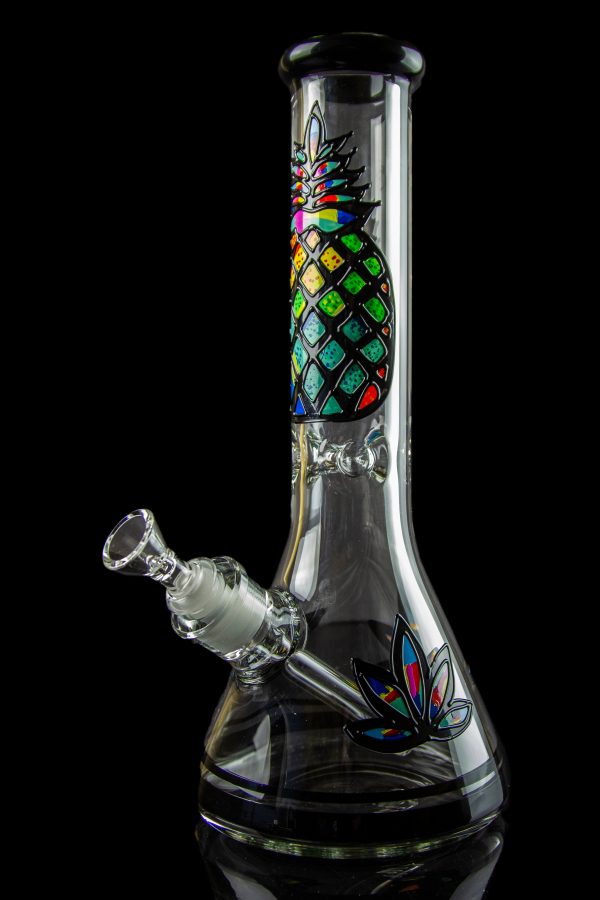 Glass bong with colorful geometric and floral designs, isolated on black.