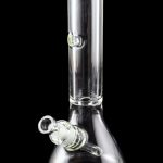 Clear glass bong with a flared base and ice catcher, isolated on black.