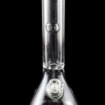 Clear glass water pipe (bong) with a flared base, reflecting on a dark surface.