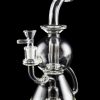 Clear glass water pipe (rig) with intricate bubbler design, isolated on black.