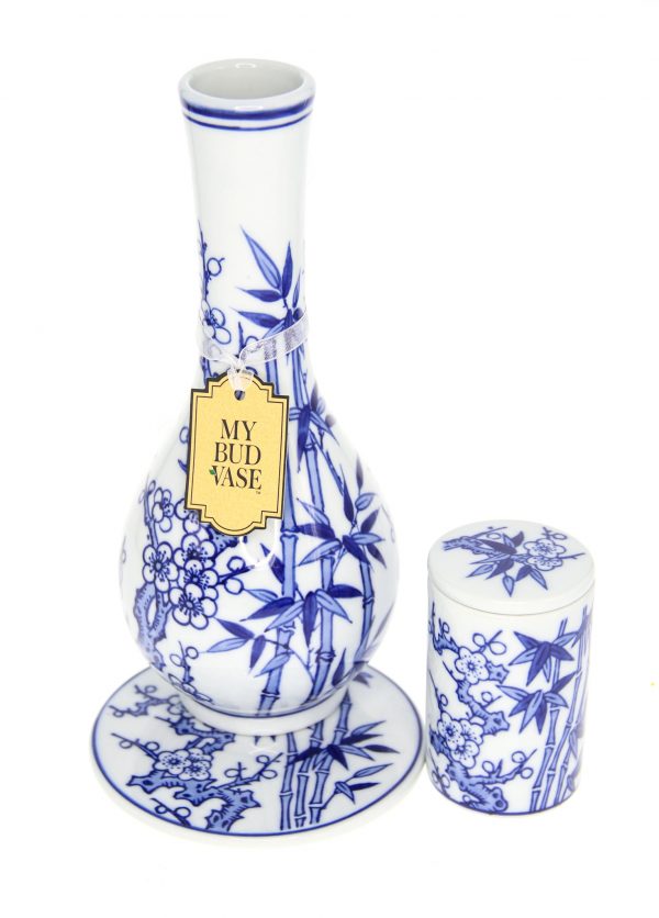 A slightly angled view of the “My Bud Vase “Luck” Porcelain Vase Bong,” featuring a delicate floral pattern on white porcelain.