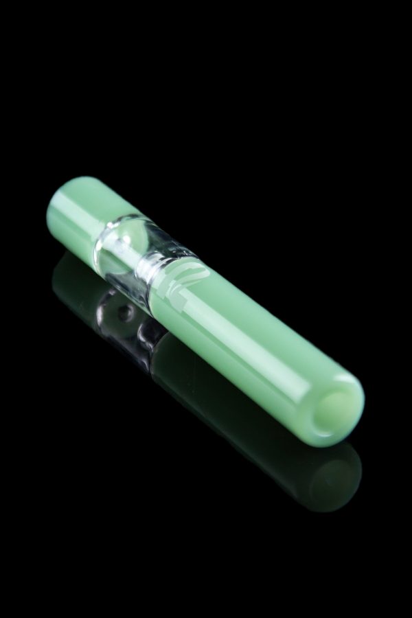 Frosted green glass chillum with visible chamber, reflecting on a dark surface.