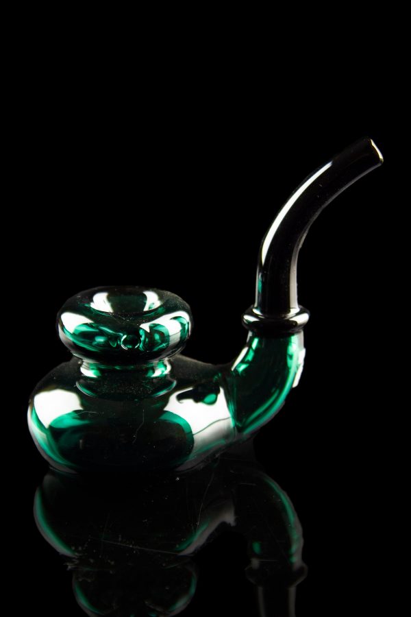 Emerald green glass water pipe against a black background.