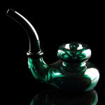 Emerald green glass water pipe against a black background.