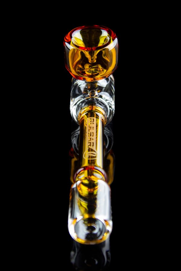 A vibrant glass pipe with orange and yellow accents, featuring the brand name “Pulse” etched along its clear body.