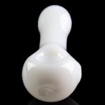 White glass bubbler with a rounded base and narrow neck, reflected on a black surface.