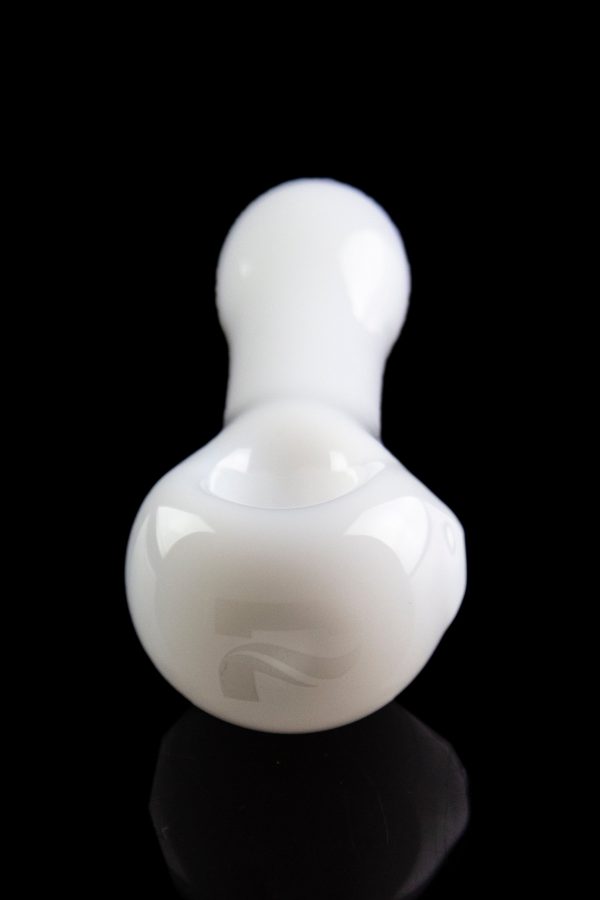 White glass bubbler with a rounded base and narrow neck, reflected on a black surface.