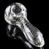 A close-up, angled view of the Pulsar Bubble Matrix Spoon Pipe, showcasing its clear glass construction and bubble detailing.