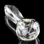 Clear glass pipe with textured surface and reflective black background.