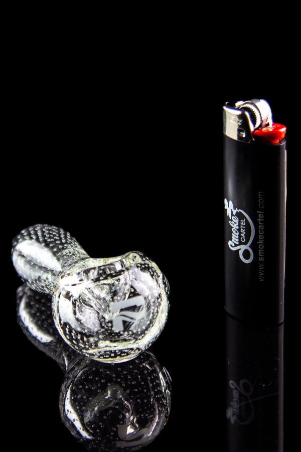 Glass cannabis pipe and lighter with branding, studio shot.