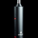 Black Starlite vaporizer pen with a glass mouthpiece, displayed against a dark background.