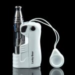 White cannabis oil vaporizer pen with glass cartridge and magnetic mouthpiece, reflected on a black surface.