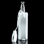 White silicone sleeve protecting a glass pipe, reflecting on a black surface.