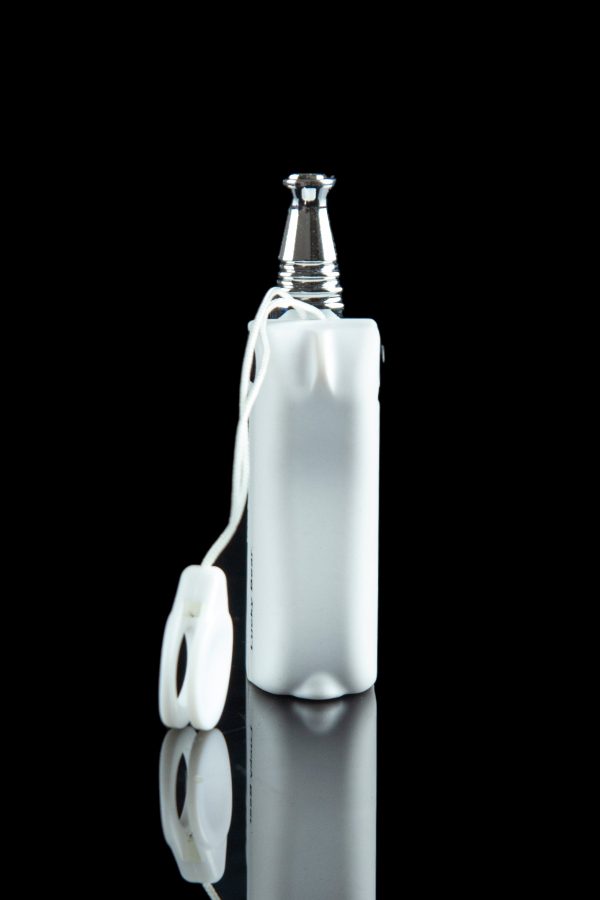 White silicone sleeve protecting a glass pipe, reflecting on a black surface.