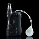 Black cannabis vaporizer pen with a clear glass attachment and white silicone caps, reflecting on a glossy surface.