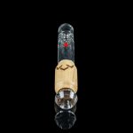 Glass dab rig with wooden accent and clear glass components, isolated on black.