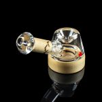 A clear glass bubbler pipe with a wooden mouthpiece, isolated on a black background.