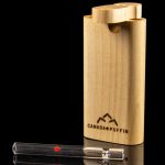 Wooden cannabis pipe with glass smoking accessory and Canadian flag detail, studio shot.