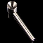 Silver oil burner pipe for cannabis concentrates against a black background.