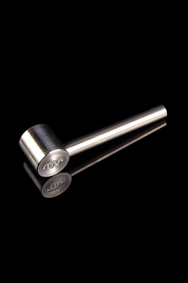 Silver cannabis oil burner pipe with engraved logo on black background.