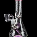 Clear glass bong with pink accents and intricate internal perculation, featuring a glass bowl and downstem.