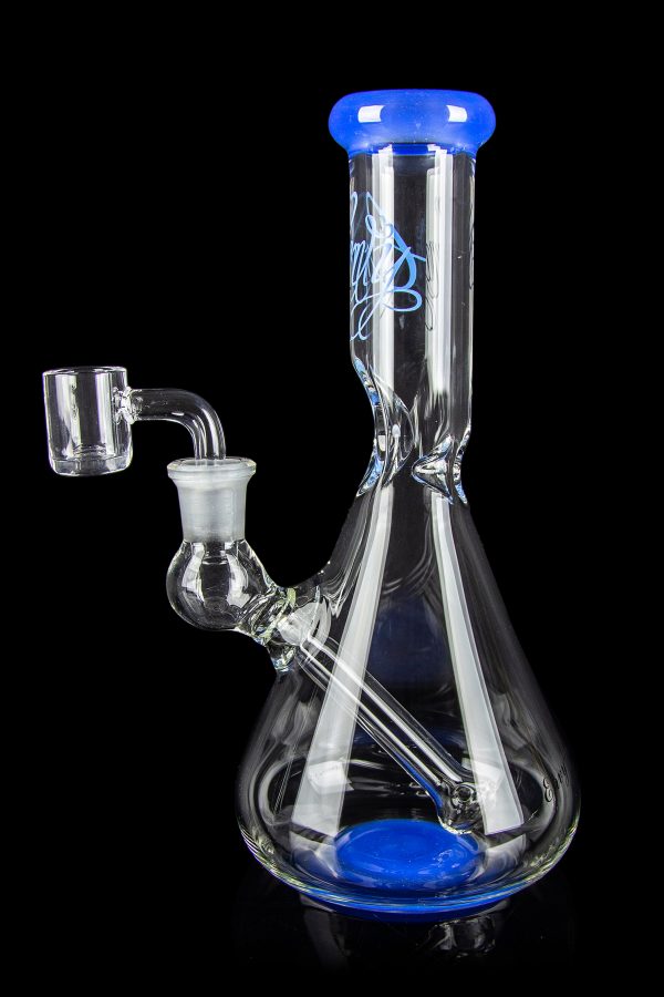 Glass bong with blue accents and a quartz nail.