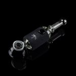 Glass pipe with black, textured wrap and reflective surface, studio shot.