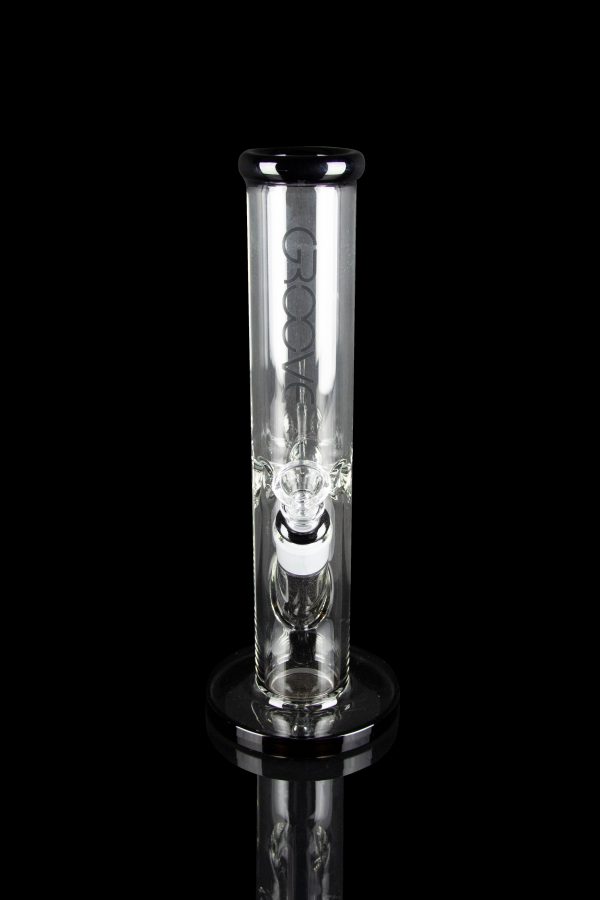 Clear glass water pipe with percolators, isolated on a black background.