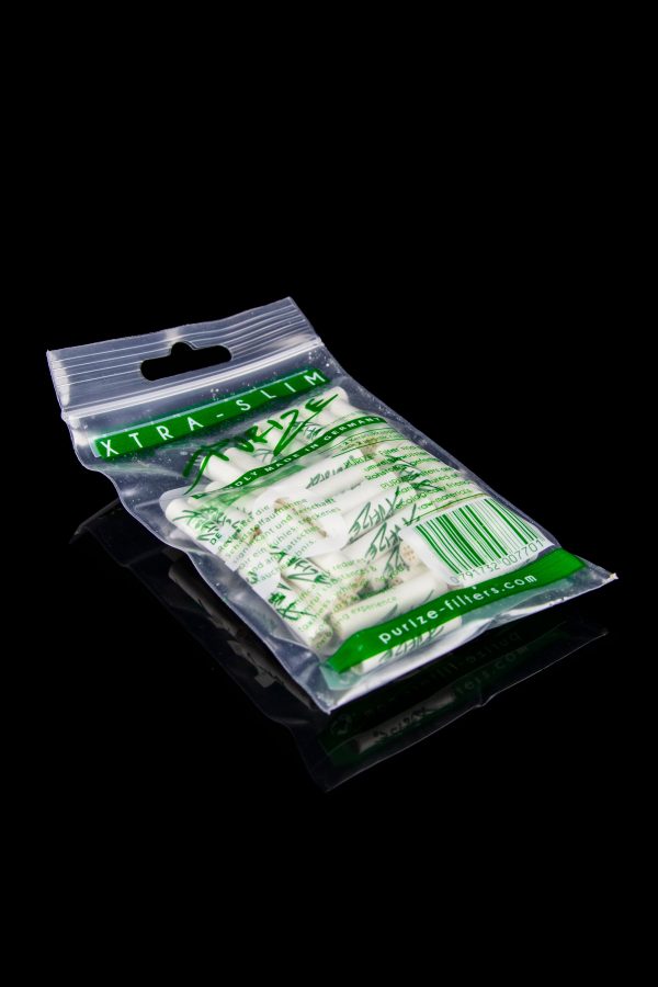 Pack of Purize XTRA-SLIM cannabis filters in green packaging.