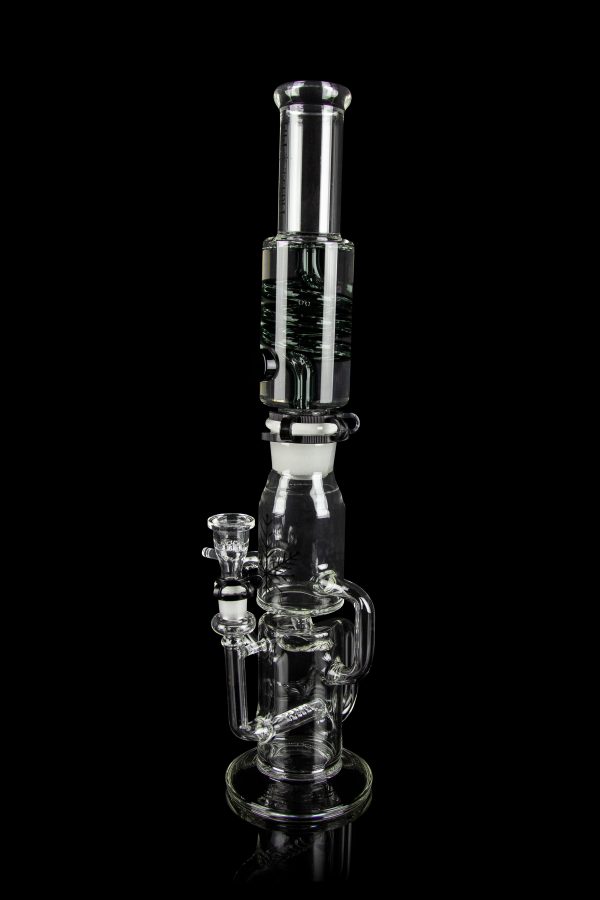 Clear glass water pipe (bong) with multiple chambers and a glass bowl, isolated on a black background.