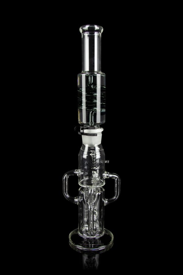 Clear glass water pipe (rig) with multiple chambers and percolators, isolated on a black background.