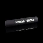Black cannabis one-hitter pipe and case with white text reading "HUMAN SUCKS".