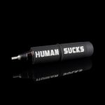 Black cannabis smoking pipe with white text reading “HUMAN SUCKS” displayed on its side.
