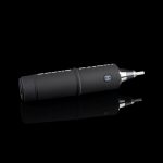 Black electronic dab rig with metallic tip, reflected on a dark surface.