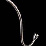 Silver cannabis oil rig downstem against a black background.