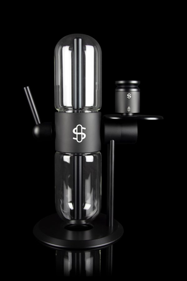 Sleek black cannabis oil vape pen and cartridge with a dollar sign logo, studio shot.