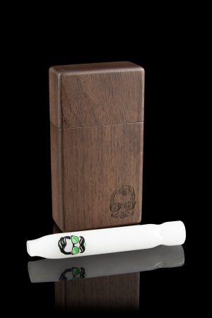 Wooden dugout with a skull engraving and a white one-hitter resting on a reflective surface.
