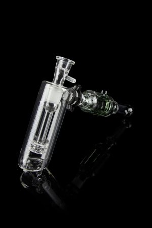 Clear glass bubbler and oil rig with intricate design, isolated on black.