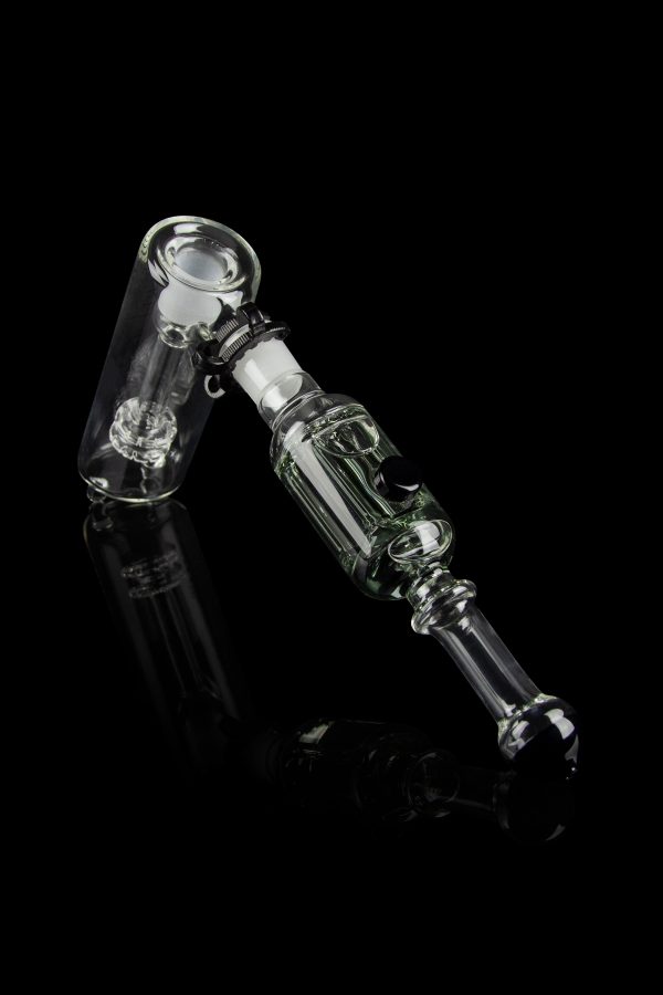 Clear glass oil rig with percolator, isolated on black.