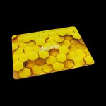 Yellow honeycomb-patterned cannabis accessory with “Inspire” logo.