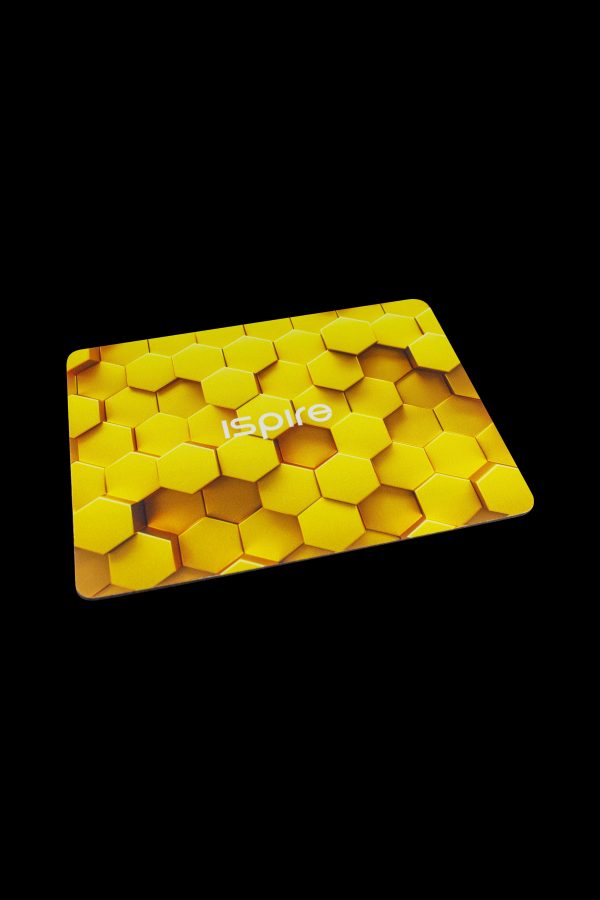 Yellow honeycomb-patterned cannabis accessory with “Inspire” logo.